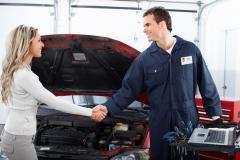 bigstock-Handsome-mechanic-and-client-w-15801074